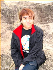 Cute Japanese guy gets naked on the beach