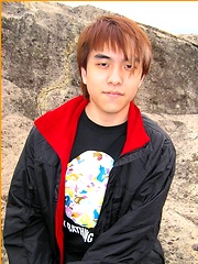 Cute Japanese guy gets naked on the beach