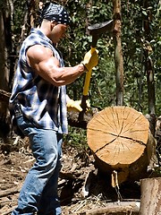 Hot hunk demonstrates hisd muscles in a forest