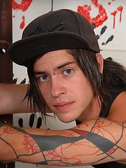 Cute emo boy demonstrates his naked body