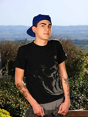 Skater boy in outdoor softcore scene