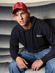 Blond twink Abner shows his big uncut cock