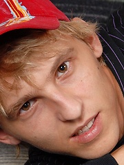 Blond twink Abner shows his big uncut cock