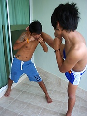 16 photos of cute gay Thai kickboxer posing and stripping