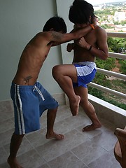 16 photos of cute gay Thai kickboxer posing and stripping