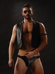 Big fireman shows his muscle naked body