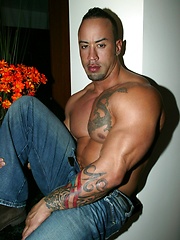 Big muscled latin dude posing before camera