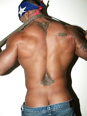 Big muscled latin dude posing before camera