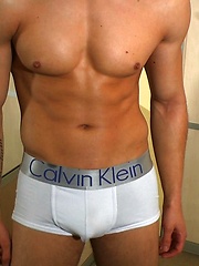 Young and sexy jock showing his hot beefy body