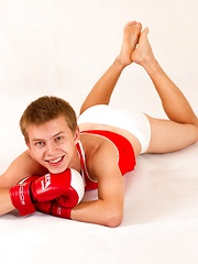 Sporty straight Eugene Small posing in boxing gloves