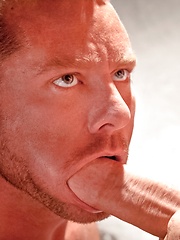 Two muscled fireworkers have fun after hard work day