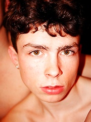 Curly boy blows his buddy cock