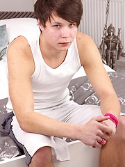 Cute twink shows his uncut cock