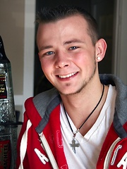 Tattooed Kyle Collins stroking his small cock.