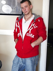 Tattooed Kyle Collins stroking his small cock.